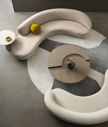 Go for two curved loveseats.
