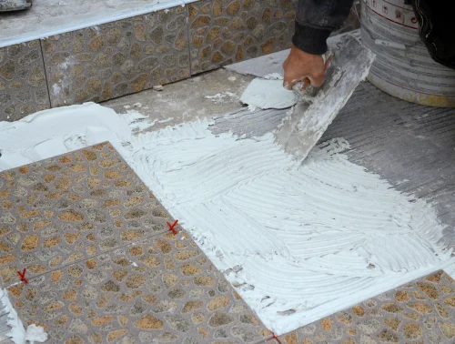 Adhesives for tiles